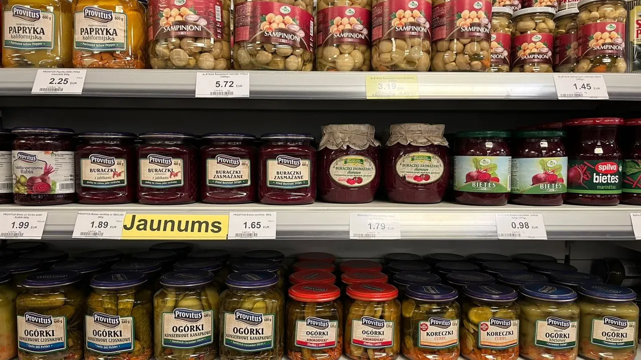 Provitus pickled cucumbers, stewed beetroot and marinated peppers in jars on a shop shelf