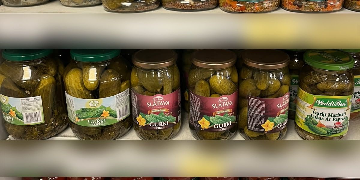 SLĀTAVA pickled cucumbers on a shop shelf