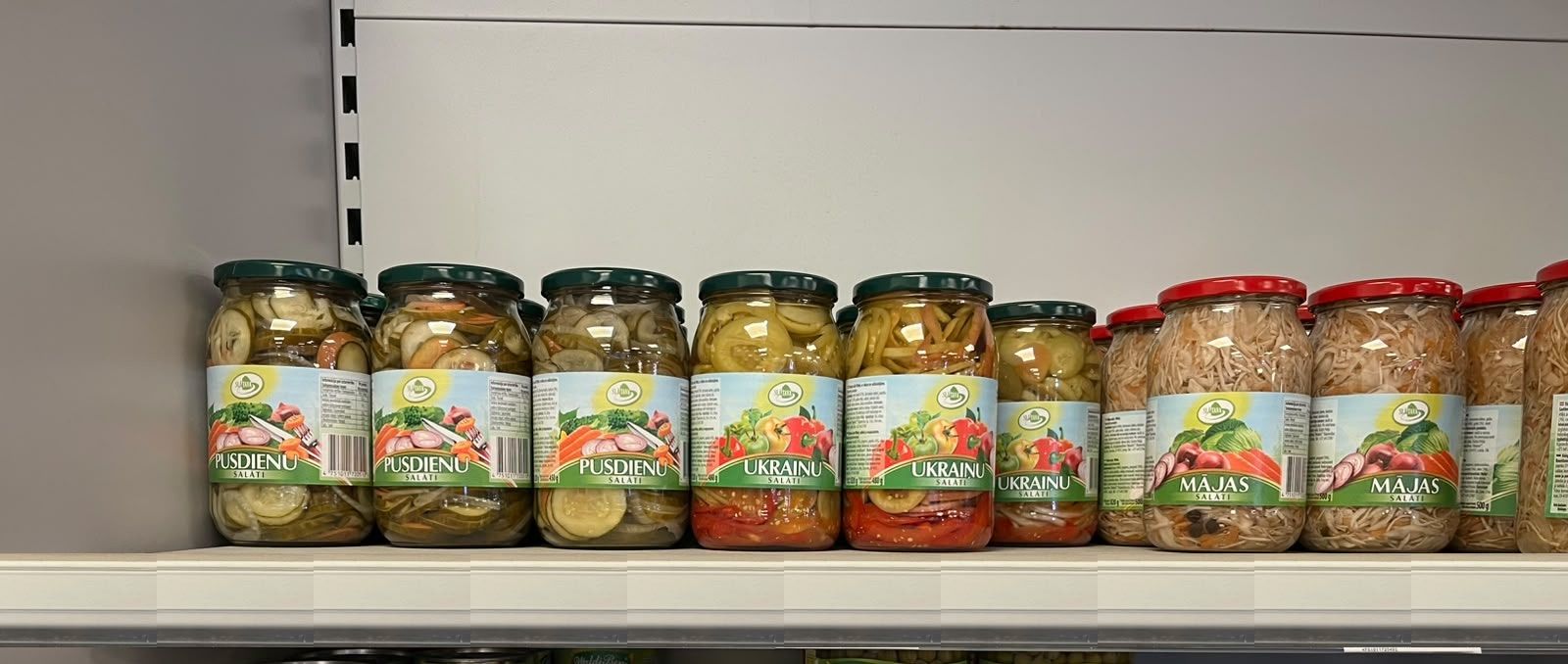 SLĀTAVA salads and pickles on a shop shelf